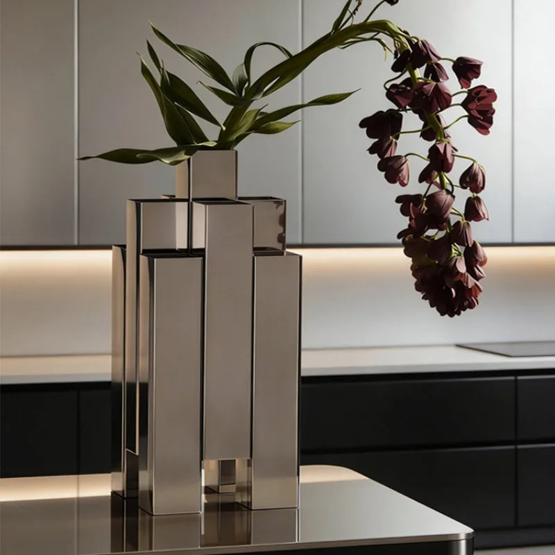 Modern geometric vase with flowers, highlighting elegance. A required field is missing.